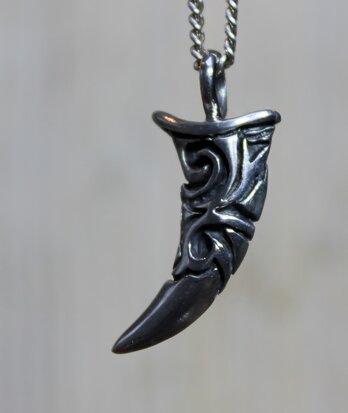 stoere zilveren tand voor ketting