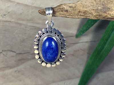 zilveren hanger blauwe steen